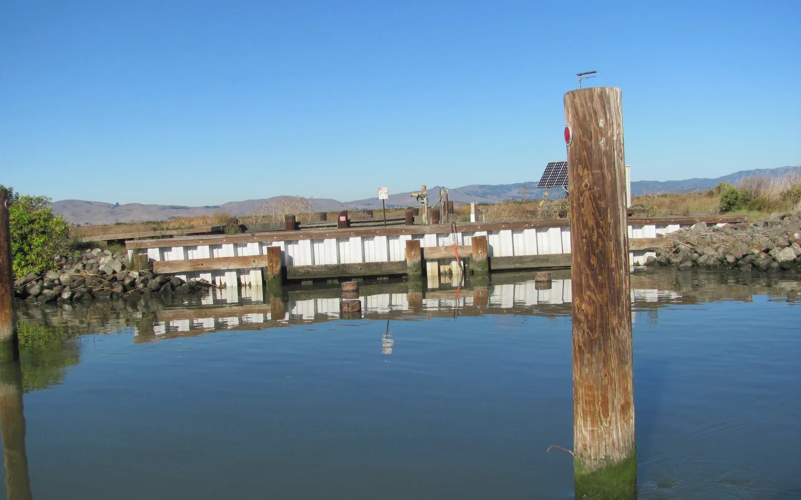 Montezuma Slough wetland and waterway in the Sacramento-San Joaquin Delta, showing tidal channels and marsh vegetation